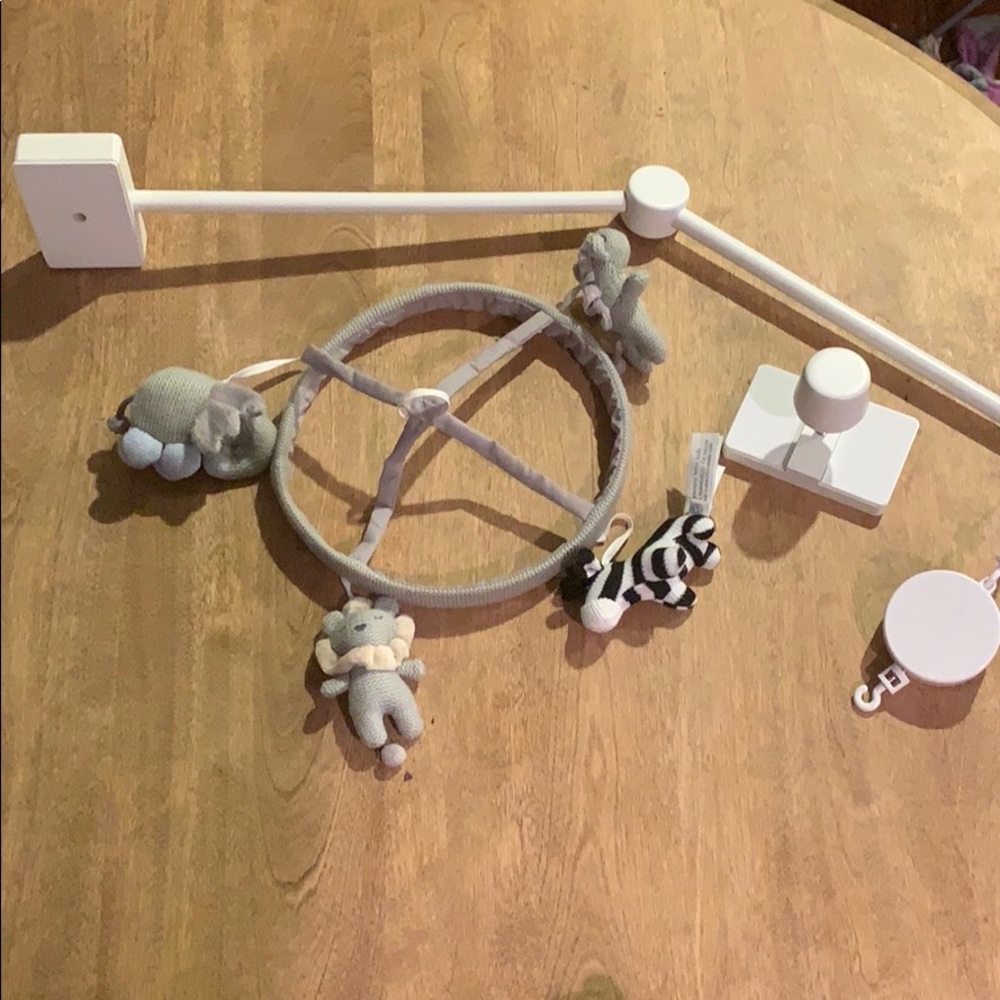Pottery barn mobile and crib arm